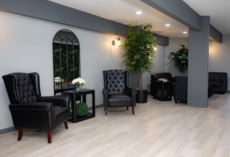 Wing chairs and white roses